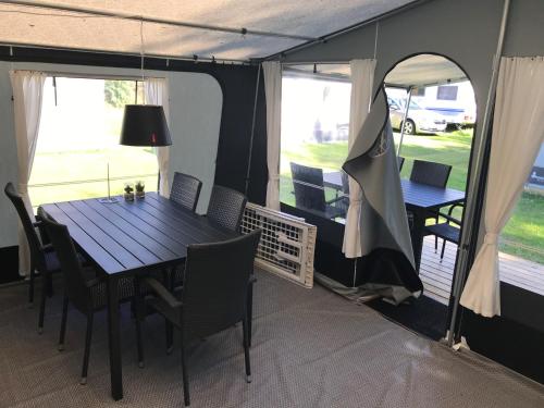 Un lugar para sentarse en Gl. Klitgaard Camping & Cottages