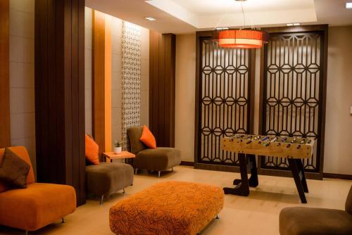 Un lugar para sentarse en De Hug Hotel & Residence
