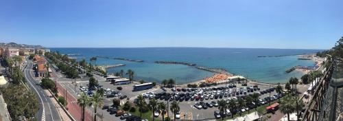 an aerial view of a beach and the ocean at Lolli Palace Hotel in Sanremo