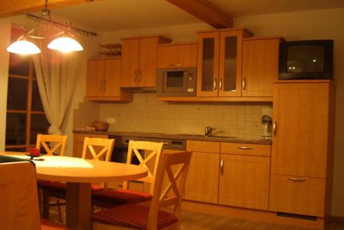 Köök või kööginurk majutusasutuses Tischlergut