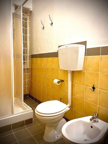a bathroom with a toilet and a sink at Sweet Rome B&B in Rome