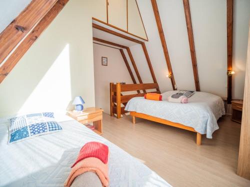Postel nebo postele na pokoji v ubytování Gîtes individuels à Kaysersberg