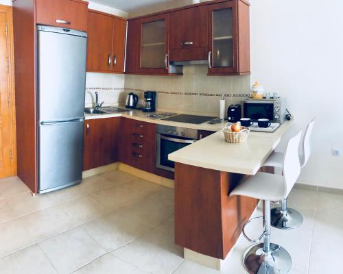 Kuchyň nebo kuchyňský kout v ubytování Casa Abuela Pepa