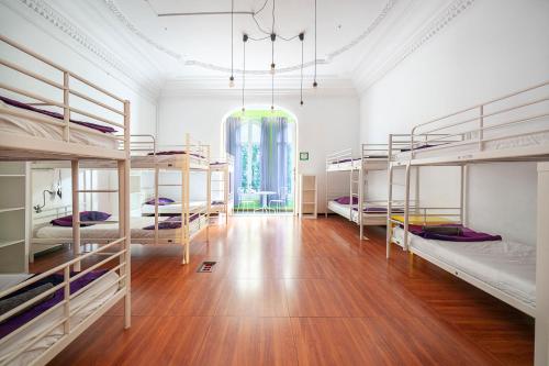 Posteľ alebo postele v izbe v ubytovaní Fabrizzios Terrace Hostel
