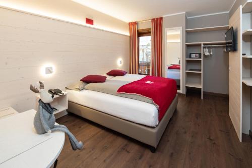 Postel nebo postele na pokoji v ubytování Hotel Krone