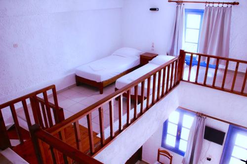 Ένα ή περισσότερα κρεβάτια σε δωμάτιο στο Joanna Apartments 