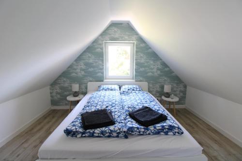 Ένα ή περισσότερα κρεβάτια σε δωμάτιο στο Beach house