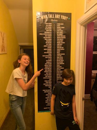 two girls are standing next to a sign at Albert's Rest in Ramsgate