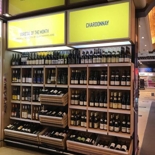 a display of bottles of wine in a store at Barracuda Resort in Umm Al Quwain
