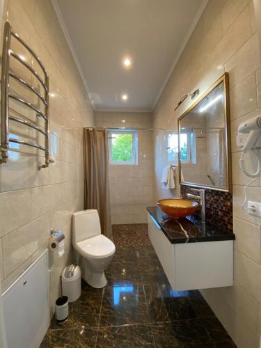 Ванна кімната в Dream Apartament