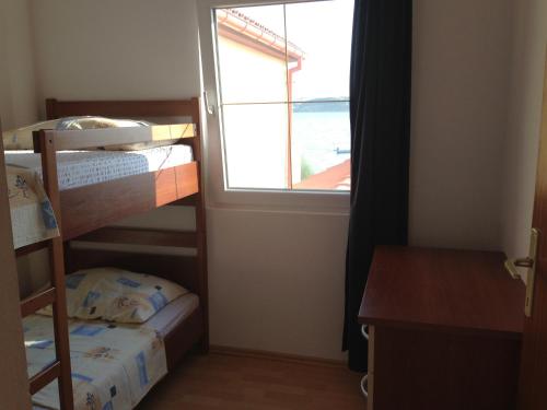 Posteľ alebo postele v izbe v ubytovaní Apartment 4 Persons - direct by the sea, 1st floor