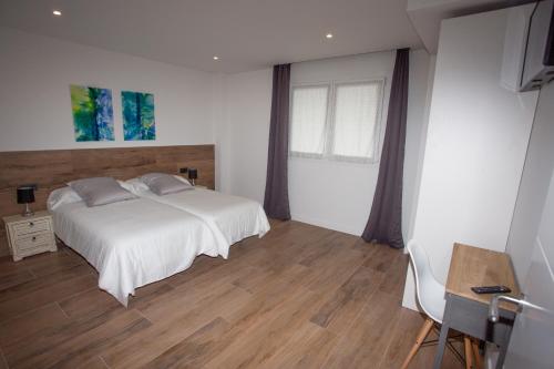 Postel nebo postele na pokoji v ubytování Agroturismo Basitegi