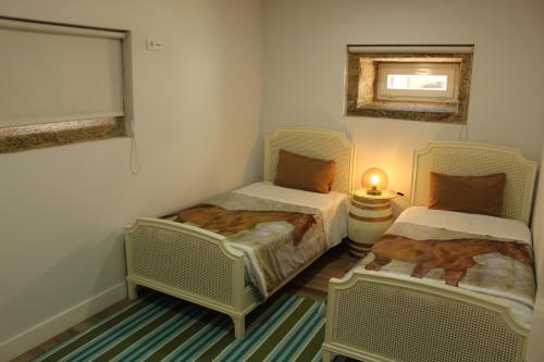 Postel nebo postele na pokoji v ubytování Casa Pena