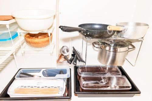 a kitchen utensils are sitting in a refrigerator at Nishihan in Kyoto