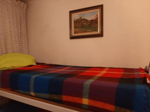 Een bed of bedden in een kamer bij Apartamento para Temporada no Gonzaga