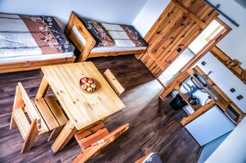 an overhead view of a tiny house with a table and bed at Apartmány Moravský Grunt in Olomouc