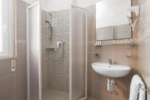 Koupelna v ubytování Hotel Très Jolie