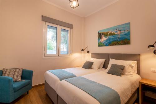Postel nebo postele na pokoji v ubytování Bitsakis Family I - Paleochora Luxury House