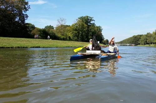 two people in a kayak on a lake at Wohnung in Leipzig