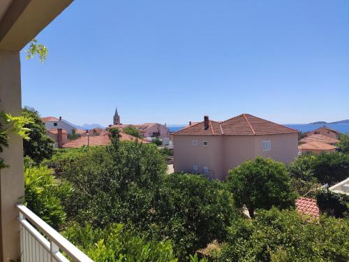 a view from the balcony of a house at Apartmani Marijela in Orebić