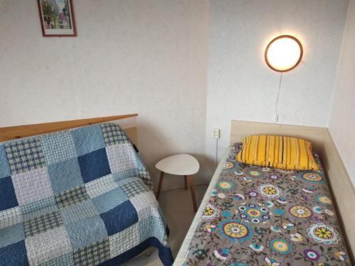 Postel nebo postele na pokoji v ubytování Tartu Student Home