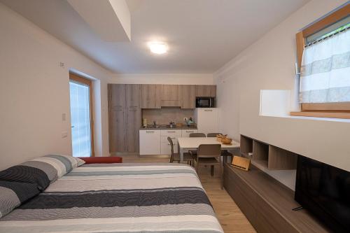 Säng eller sängar i ett rum på Appartamento S. Croce