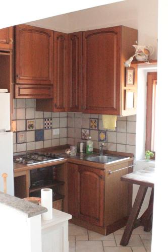 Kuchyň nebo kuchyňský kout v ubytování Un Quadro Sulla Giannella