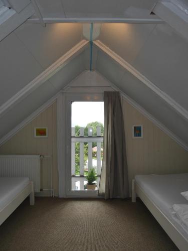 Postel nebo postele na pokoji v ubytování Sonja House Abertamy