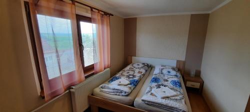 Voodi või voodid majutusasutuse Privát Tatry Štrba toas