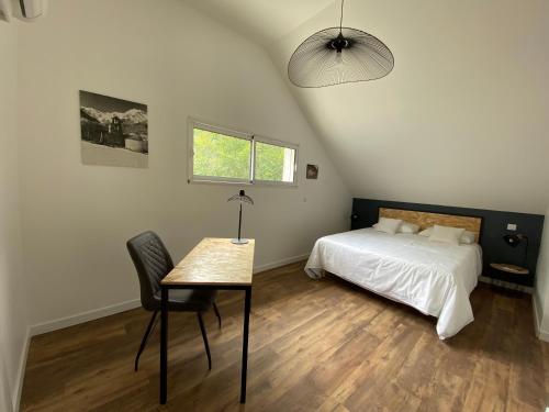 Un pat sau paturi într-o cameră la Aou Saintou