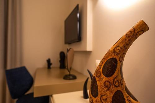 TV a/nebo společenská místnost v ubytování River Villas Parga