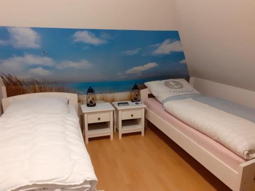 Ein Bett oder Betten in einem Zimmer der Unterkunft Bi Grete tohuus