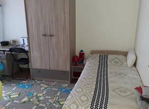 Ein Bett oder Betten in einem Zimmer der Unterkunft Bel Appartement Montreuil