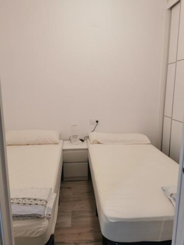 Un pat sau paturi într-o cameră la Patios I