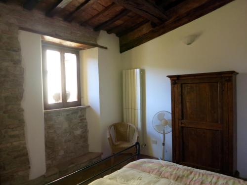 Katil atau katil-katil dalam bilik di Agriturismo Colle del Lupo