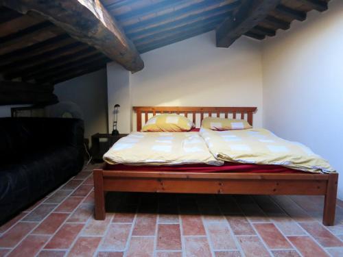 Кровать или кровати в номере Agriturismo Colle del Lupo