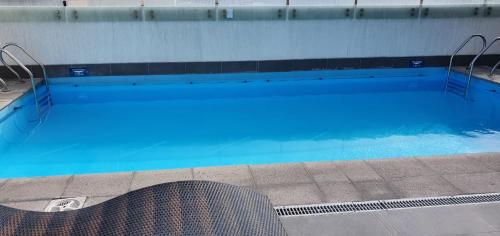 The swimming pool at or close to Edificio Bulnes - Cavancha