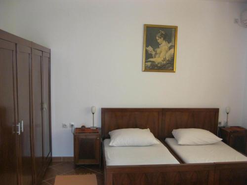 Postel nebo postele na pokoji v ubytování Apartments Miana