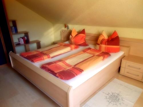 Postel nebo postele na pokoji v ubytování Ferienwohnung Moosdorf