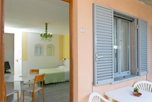 Postel nebo postele na pokoji v ubytování Residence Castiglione