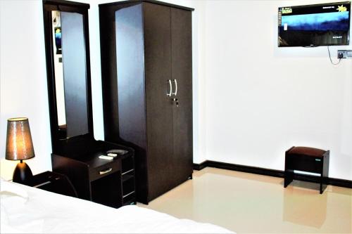 TV a/nebo společenská místnost v ubytování Sky White Villa