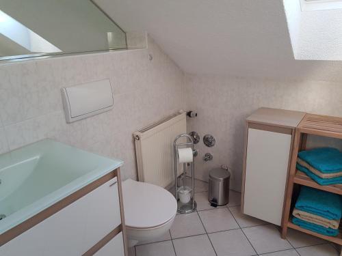 Ένα μπάνιο στο Ferienwohnung Willkommen