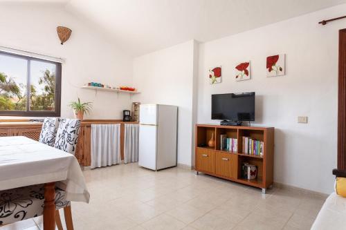 Televisyen dan/atau pusat hiburan di Oasis en Cotillo
