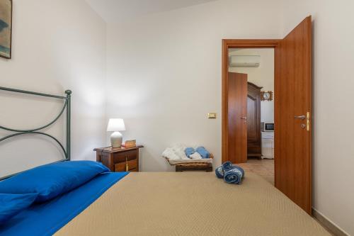 Postel nebo postele na pokoji v ubytování Sa Corte de Dinu