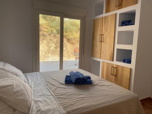 A bed or beds in a room at Casa Ladera