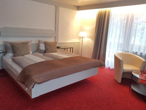 En eller flere senge i et værelse på Hotel Restaurant Kniebishöhe