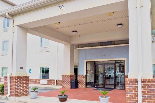 a front view of a building with a door at Econo Lodge in Augusta