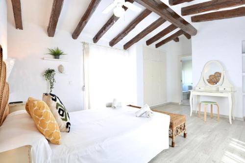 Postel nebo postele na pokoji v ubytování Urbanización El Oasis, 20 Villas en 1ª Línea Playa