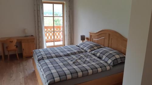 Postel nebo postele na pokoji v ubytování Landhaus Wolfgang