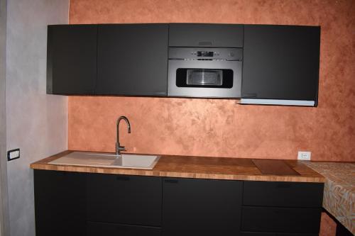 Η κουζίνα ή μικρή κουζίνα στο Garda Fantasy Apartment - JACUZZI
